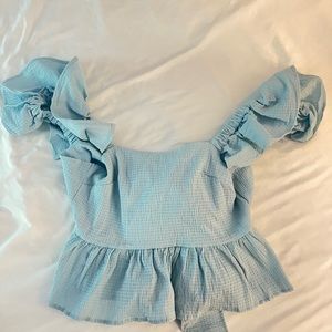 NWT francesca’s peplum bow top- size M